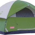 Coleman Sundome 6-person camping tent set up in forest during summer trip