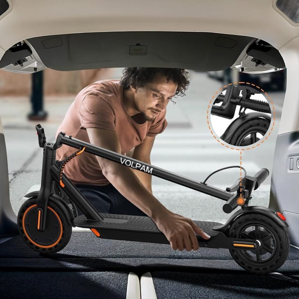 The Volpam Q1 being folded and stored easily in a car trunk, showcasing its lightweight and compact foldable design.